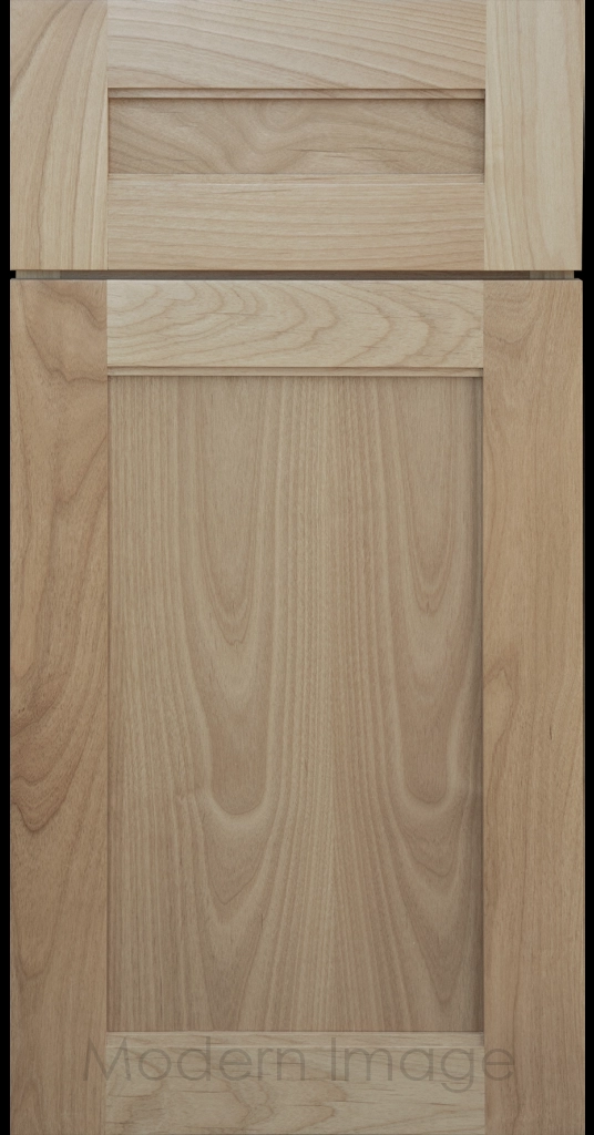 Destin shaker cabinet in Blondie Stain featuring ledge detail and vertical joints around a recessed center panel.